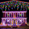 Solar icicle curtain lights on eaves