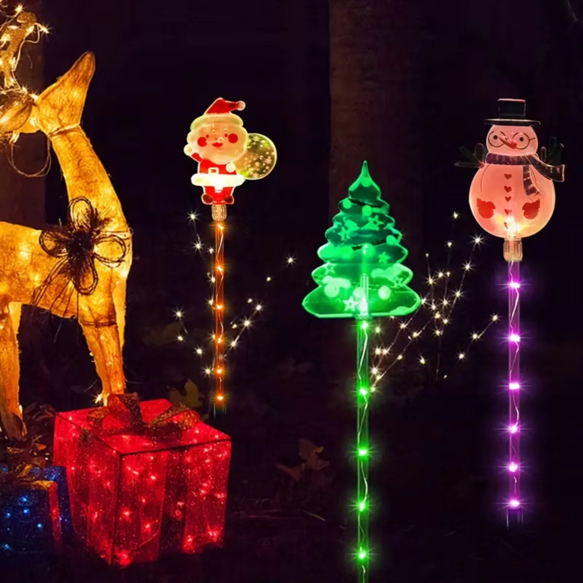 Solar stake lights in a garden at night